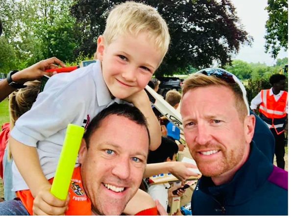 Paul Collingwood with a Cricket Tikes family